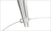 flat-nose pliers crimping a crimp tube on beading wire